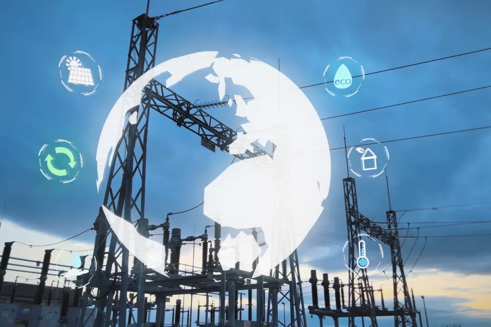 Power plant infrastructure against a sky at dusk with a virtual white globe overlaid on top.